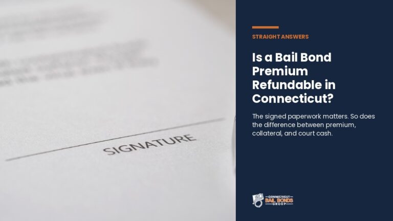 Family reviewing bail bond receipt and signed paperwork